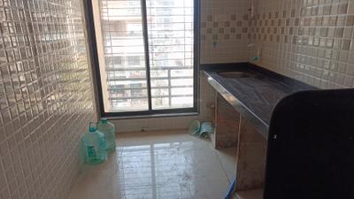 Kitchen Image of 920 Sq.ft 2 BHK Apartment / Flat for rent in Dwisha Developers Dwisha Height, Taloja Navi Mumbai for Rs. 19000