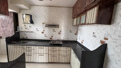 Kitchen Image of 990 Sq.ft 2 BHK Apartment / Flat for rent in Evershine Millennium Paradise, Kandivali East Mumbai for Rs. 65000