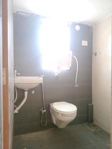 Common Bathroom Image of 1100 Sq.ft 2 BHK Apartment / Flat for sale in Rajhans Kshitij - Arum, Vasai West Vasai for Rs. 9000000