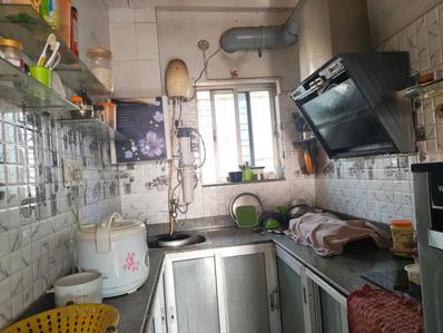 Kitchen Image of 1250 Sq.ft 3 BHK Apartment / Flat for sale in Nayabad Kolkata for Rs. 4300000