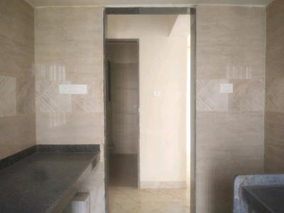 Kitchen Image of 910 Sq.ft 3 BHK Apartment / Flat for sale in Tharwani Vedant Millenia, Titwala Thane for Rs. 6100000