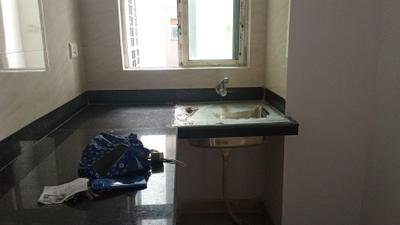 Kitchen Image of 956 Sq.ft 2 BHK Apartment / Flat for sale in Eden Tolly Signature Plus, Kabardanga Kolkata for Rs. 4800000