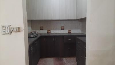 Kitchen Image of 1350 Sq.ft 3 BHK Builder Floor for rent in Janakpuri New Delhi for Rs. 51000