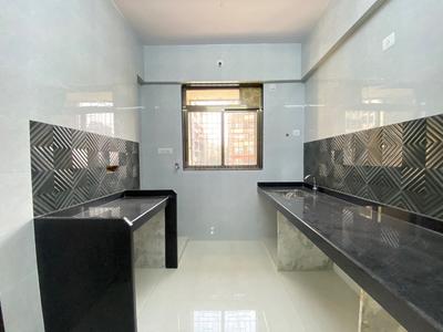 Kitchen Image of 670 Sq.ft 1 BHK Apartment / Flat for sale in Balaji Krishna, Dombivli East Thane for Rs. 4355000