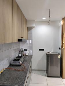 Kitchen Image of 1215 Sq.ft 2 BHK Apartment / Flat for rent in Orchid Blues, Shela Ahmedabad for Rs. 38500