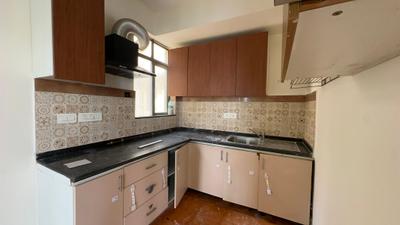 Kitchen Image of 920 Sq.ft 2 BHK Apartment / Flat for sale in Unitech Uniworld Gardens 2, Sector 47 Gurgaon for Rs. 14800000