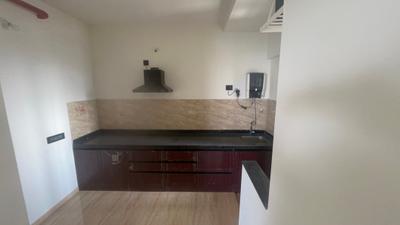 Kitchen Image of 900 Sq.ft 2 BHK Apartment / Flat for sale in VTP Beaumonde Building T3, Manjari Khurd Pune for Rs. 12500000