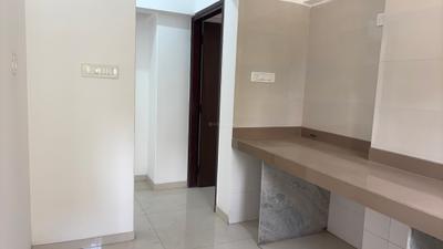 Kitchen Image of 721 Sq.ft 1 BHK Apartment / Flat for rent in Cosmos Meluha, Khidkali Thane for Rs. 12500