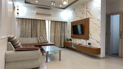 Living Room Image of 1350 Sq.ft 2.5 BHK Apartment / Flat for rent in Adani The Meadows, Shantigram Ahmedabad for Rs. 38000