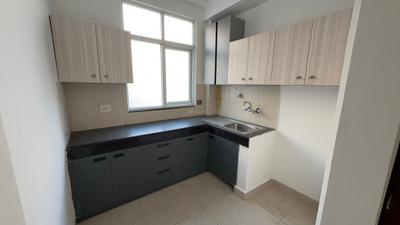 Kitchen Image of 932 Sq.ft 2 BHK Builder Floor for sale in Wave Floors, Wave City Ghaziabad for Rs. 8600000