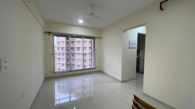 Living Room Image of 550 Sq.ft 1 BHK Apartment / Flat for sale in Godrej Nest, Kandivali East Mumbai for Rs. 10700000