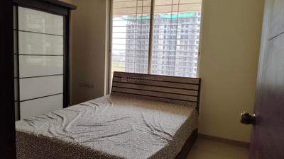 Bedroom Image of 700 Sq.ft 2 BHK Apartment / Flat for rent in Gagan Micasaa, Wagholi Pune for Rs. 21000