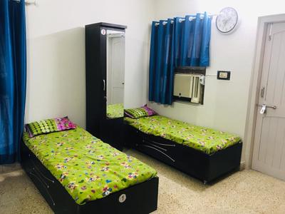 Bedroom Image of City House Girls PG in Ellisbridge, Ahmedabad
