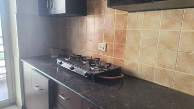 Kitchen Image of 949 Sq.ft 2 BHK Apartment / Flat for rent in Gardenia Glory, Sector 46 Noida for Rs. 38000