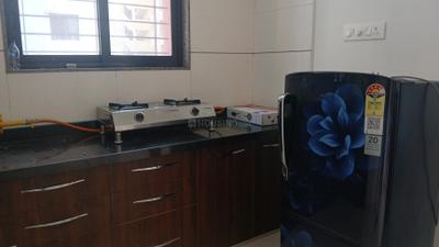 Kitchen Image of 720 Sq.ft 1 BHK Apartment / Flat for rent in Nova Galaxy, Palanpur Surat for Rs. 20000