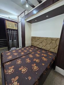 Bedroom Image of 1000 Sq.ft 2 BHK Builder Floor for rent in Ramesh Nagar New Delhi for Rs. 26000