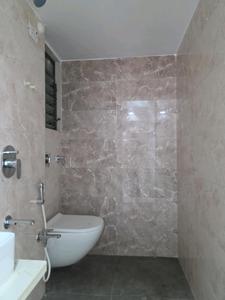 Common Bathroom Image of 700 Sq.ft 1 BHK Apartment / Flat for sale in Yashwant Empire, Vasai East Vasai for Rs. 3800000