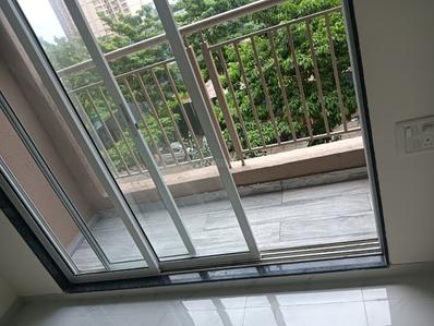 Balcony Image of 900 Sq.ft 2 BHK Apartment / Flat for sale in Anant Metropolis Insignia Towers, Kasarvadavali Thane for Rs. 9499999