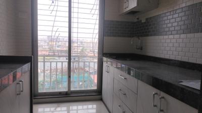 Kitchen Image of 680 Sq.ft 1 BHK Apartment / Flat for sale in Niharika Absolute, Kharghar Navi Mumbai for Rs. 7000000