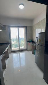 Kitchen Image of 550 Sq.ft 1 BHK Apartment / Flat for rent in Arihant Aarohi, Shilgaon Thane for Rs. 16000