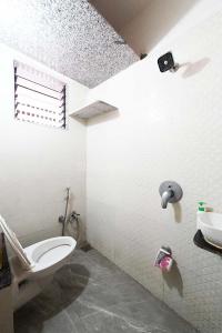 Bathroom Image of 1260 Sq.ft 2 BHK Apartment / Flat for sale in United Zade, Vinzol Ahmedabad for Rs. 4051000