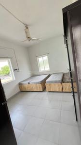 Bedroom Image of Sorath Girls Pg in Naranpura, Ahmedabad
