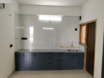 Kitchen Image of 1200 Sq.ft 3 BHK Apartment / Flat for rent in Krishna Crystal Heights, Bhadaj Ahmedabad for Rs. 21000