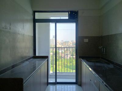 Kitchen Image of 720 Sq.ft 1 BHK Apartment / Flat for sale in Krishna Ultima, Kalyan East Kalyan for Rs. 4100000