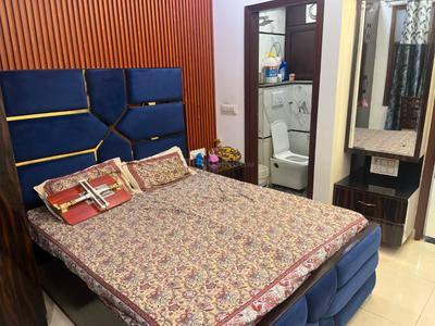 Bedroom Image of 600 Sq.ft 2 BHK Builder Floor for rent in Guru Ji Vipin Garden, Dwarka Mor New Delhi for Rs. 20000