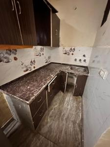 Kitchen Image of 300 Sq.ft 1 BHK Independent House for rent in  Rohini Apartments RWA, Sector 8 Rohini New Delhi for Rs. 11000