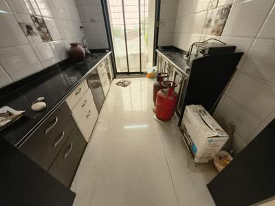 Kitchen Image of 1250 Sq.ft 2 BHK Apartment / Flat for rent in Ambika Heritage, Kharghar Navi Mumbai for Rs. 42000