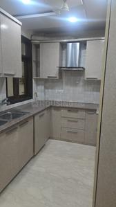 Kitchen Image of 1350 Sq.ft 3 BHK Builder Floor for rent in Janakpuri New Delhi for Rs. 48000