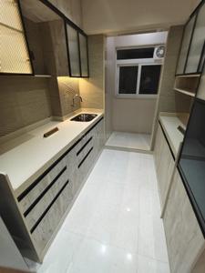 Kitchen Image of 1000 Sq.ft 2 BHK Apartment / Flat for sale in Raunak Unnathi Woods Supreme, Hiranandani Estate Thane for Rs. 12000000