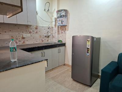 Kitchen Image of 480 Sq.ft 1 BHK Apartment / Flat for rent in Chhattarpur New Delhi for Rs. 17000