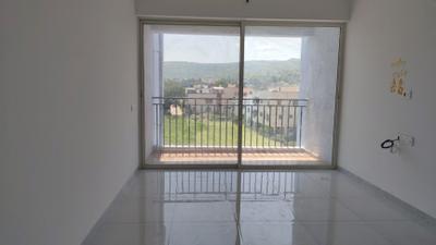 Living Room Image of 600 Sq.ft 1 BHK Apartment / Flat for rent in Karma Rejoice, Undri Pune for Rs. 13500