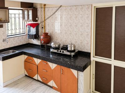 Kitchen Image of 950 Sq.ft 1 BHK Apartment / Flat for rent in Maninagar Ahmedabad for Rs. 13000