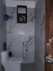 Common Bathroom Image of 1050 Sq.ft 2 BHK Apartment / Flat for sale in Ambesten Twin Chalet, Noida Extension Greater Noida for Rs. 4100000