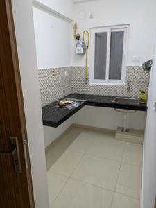 Kitchen Image of 778 Sq.ft 2 BHK Apartment / Flat for rent in Urbanrise Revolution One, Padur Chennai for Rs. 23000