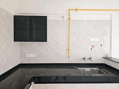 Kitchen Image of 990 Sq.ft 2 BHK Apartment / Flat for rent in Nyati Elan, Wagholi Pune for Rs. 22000