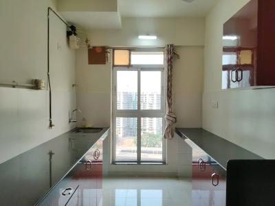 Kitchen Image of 850 Sq.ft 2 BHK Apartment / Flat for sale in Puraniks Capitol, Kasarvadavali Thane for Rs. 8400000