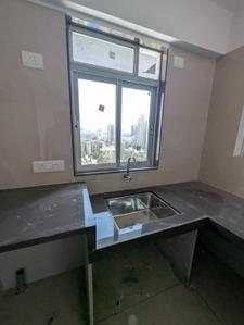 Kitchen Image of 650 Sq.ft 2 BHK Apartment / Flat for sale in Navkarmik Shiv Sneh, Kharodi Mumbai for Rs. 12400000