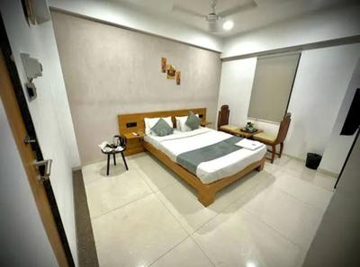 Bedroom Image of Sarthana PG House in Nana Varachha, Surat