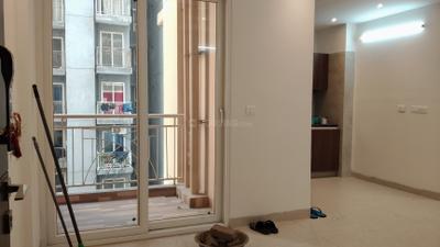 Living Room Image of 899 Sq.ft 2 BHK Apartment / Flat for sale in Aditya Urban Royale, Bamheta Village Ghaziabad for Rs. 6100000
