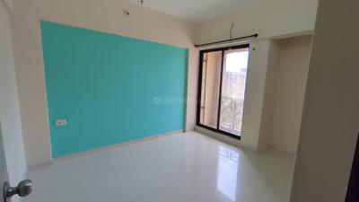 Bedroom Image of 650 Sq.ft 1 BHK Apartment / Flat for rent in Cosmos Meluha, Khidkali Thane for Rs. 12500