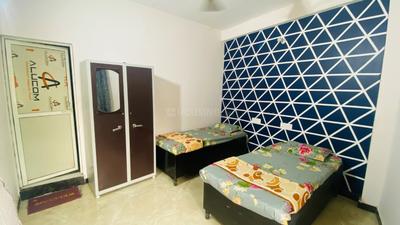 Bedroom Image of raj pg in Sector 22, Noida