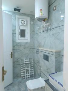 Common Bathroom Image of 1250 Sq.ft 4 BHK Builder Floor for sale in Mahavir Enclave New Delhi for Rs. 13500000