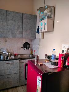 Kitchen Image of 1050 Sq.ft 2 BHK Builder Floor for rent in Sector 15 Gurgaon for Rs. 35000