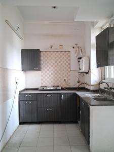 Kitchen Image of 1000 Sq.ft 2 BHK Apartment / Flat for rent in Amrapali Princely Estate, Sector 76 Noida for Rs. 36000