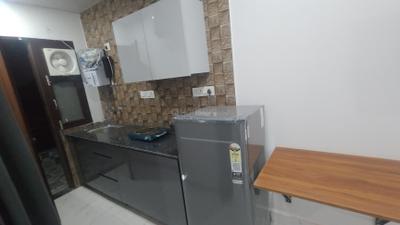 Kitchen Image of 600 Sq.ft 1 RK Builder Floor for rent in Sector 31 Gurgaon for Rs. 24000