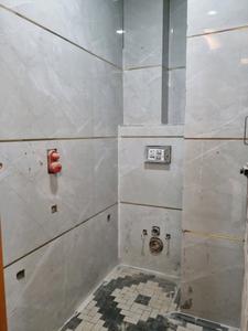 Common Bathroom Image of 600 Sq.ft 2 BHK Apartment / Flat for sale in PNM Affordable Homes, Dwarka Mor New Delhi for Rs. 3600000